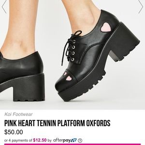 Black with pink heart platforms
